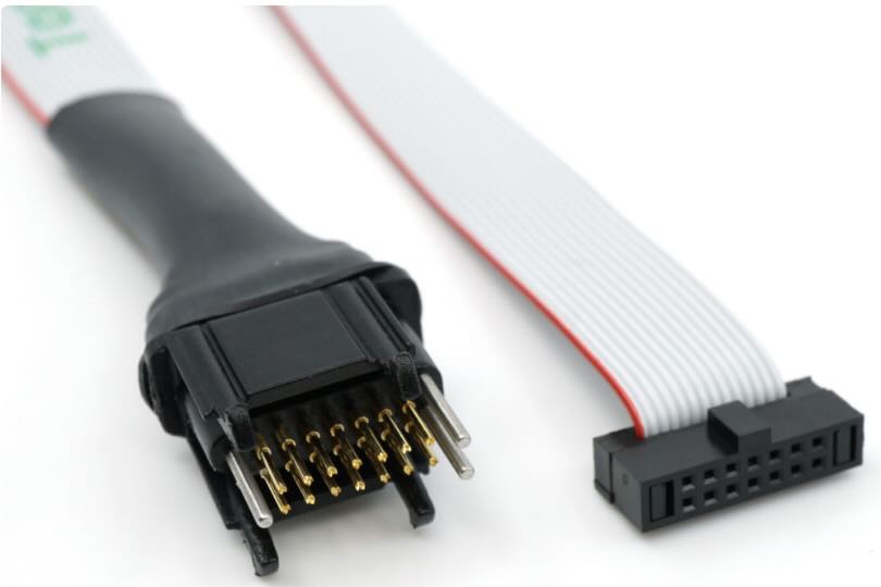 Tag-Connect TC2070 connector and cable showing the spring-loaded pins
used