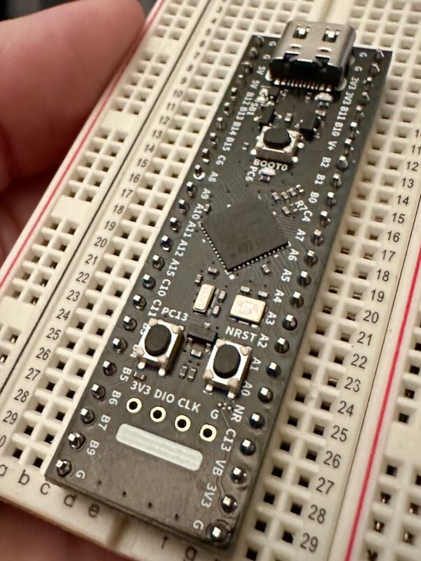 A long PCB is inserted into a
protoboard